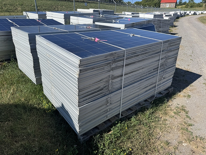 Forklift handling solar panel pallets